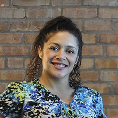 A headshot of Tatiana Jaramillo, a Nurse Practitioner at Ravenswood Health and Wellness Center.